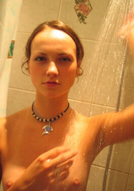 Skinny girl Tanya picked on phone camera showing how she loves sex in shower
