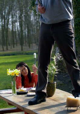 Young slut seduces an old man in the garden and gets him hard
