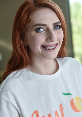 Adorable redhead practicing her jaw moves for big dicks