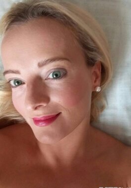 Blonde with a huge forehead showing her amazing tits