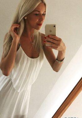 Slovenian blonde mommy displays her tight cleavage and more