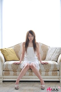 Beautiful girl from Japan in white dress prefers to sit on white ...