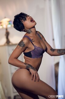 Hot solo pictures of the tattooed Asian with short hair and ...