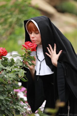 Ginger nun exposes milky boobs and untapped pinky flower in the field