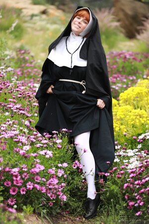 Ginger nun exposes milky boobs and untapped pinky flower in the field