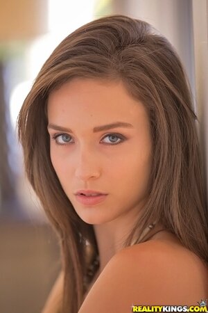 Graceful teen Malena Morgan unhurriedly strips to show her natural body