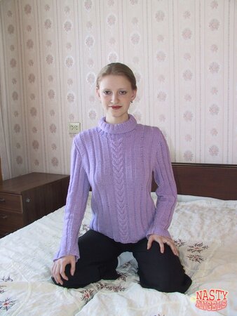 Ordinary chick in a purple sweater shamelessly strips and exposes trimmed cunt