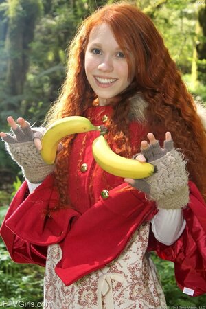 Little Red Riding Hood lost in the woods using banana to masturbate vagina