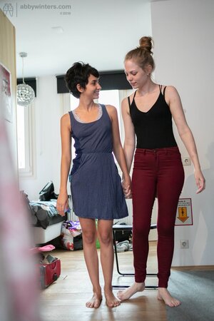 Stepsisters get prepared for college and help each other put clothes on
