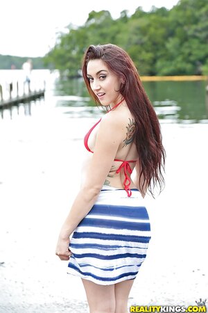 Latina pornstar has a day off so she can enjoy a boat ride wearing red bikini