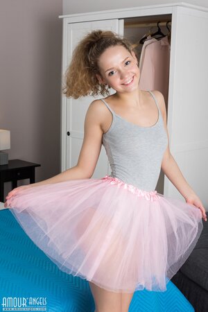 Lovely ballerina comes home from a training and wants to relax without clothes