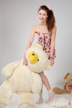 Photo shoot in the studio with plush toys ends for babe with a total striptease