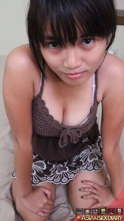 Teen Thai coed with bangs doesn't mind if stranger fucks and creampies her