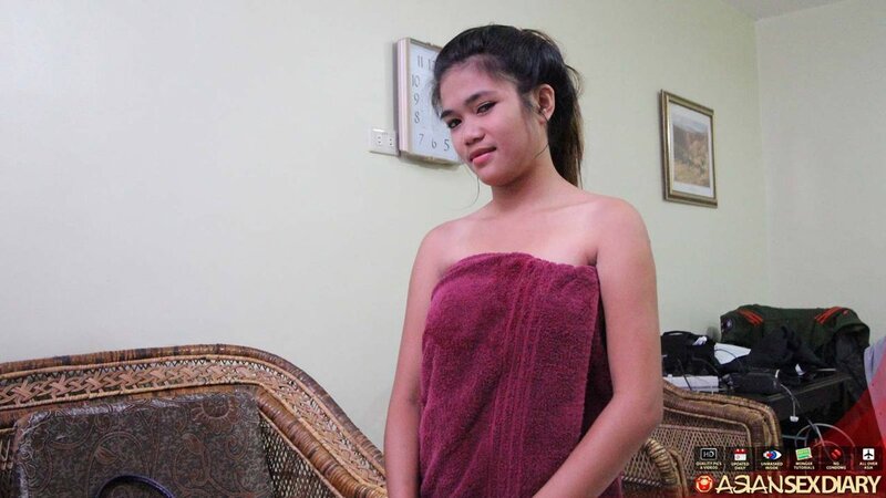 Thai babe opens her red towel flaunting pubic topiary and being nailed
