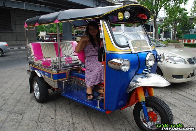 Asian teen Tukta with red hair wears sexy violet dress and prefers Tuk Tuk taxi
