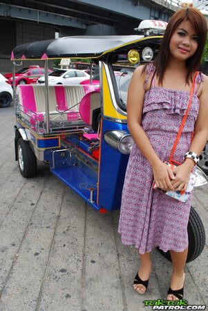 Asian teen Tukta with red hair wears sexy violet dress and prefers Tuk Tuk taxi
