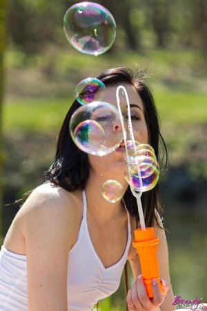 Zestful slut blows bubbles and older boyfriend's whistle getting it on outdoors