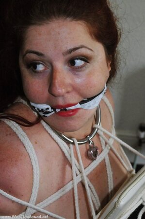 Chubby redhead is naked and tied up to chair by her dominant husband
