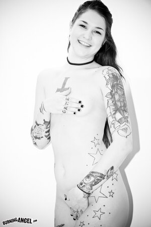 Girl with tattoos believes that she has a hot body and it's hard to argue