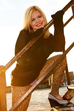 Blonde in leopard leggings is a rebel cause it's written in her purple panties
