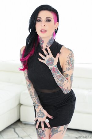 Lovely with pink temple and hair tips seems to be a big fan of tattoos