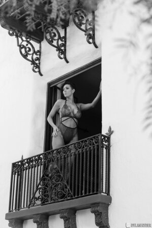 Waking up Dylan Ryder goes to the balcony to show her underwear to guys down there