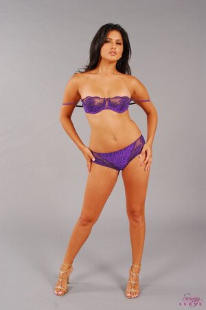 Stunning MILF from India takes off two-piece purple lingerie staring a bra