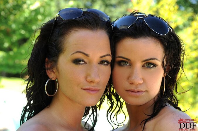 Hot brunettes with sunglasses put off swimsuits and go lesbian in the pool