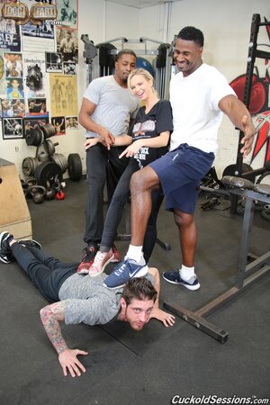 Freaky wife comes to the gym to fuck two black hunks for her hubby to watch