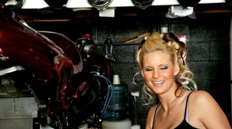 Blonde has a weakness for bikers and comes to the garage to have sex
