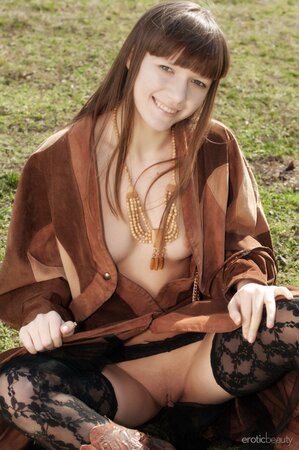 Hippie girl Red Eva opens western coat and reveals her pair of tiny titties