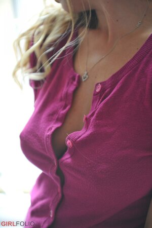 Cute blonde smiles when she is asked to undress and show her sweetest places