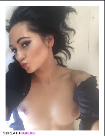 Glamorous chick enjoys getting naked after taking a couple of topless selfies
