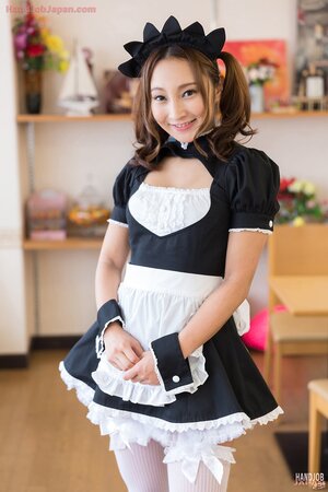 Luscious Japanese maid seduces the boss and provides him with sloppy handjob
