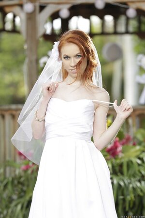 Pretty red-haired bride discards wedding dress to flaunt her sexy skinny body