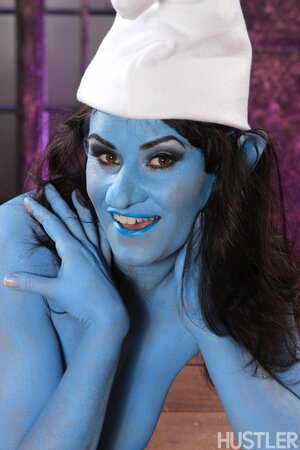 Juicy chick dressed like naughty Smurf exposes her perky tits and pink cunny