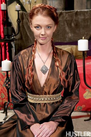 Slim redhead cosplays Game of Thrones and disrobes to show her flawless body