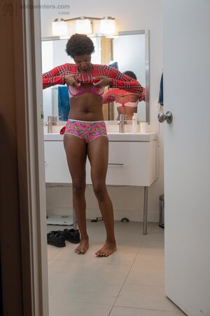 Small boobs ebony girl showing her long legs and teasing too