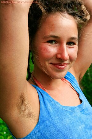 All natural girl with dreadlocks showing her bush and pits