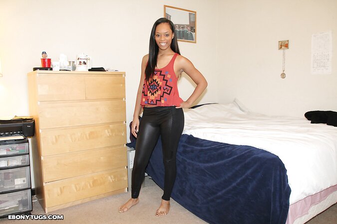 Black babe with a hot bod wears leather pants and looks sublime