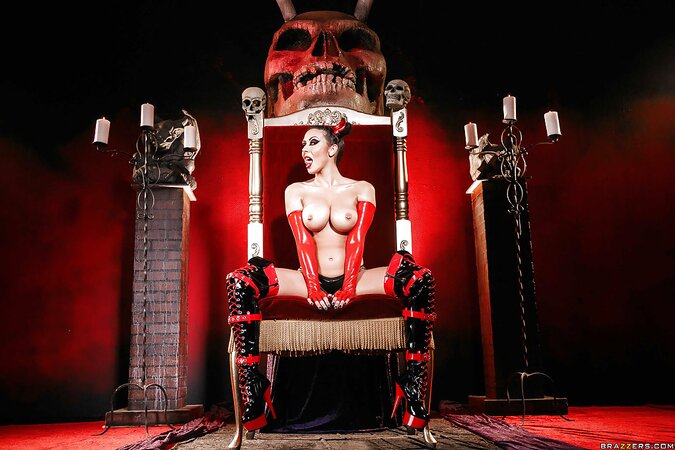 Devil temptress seduces mortals by modeling in erotic latex outfit
