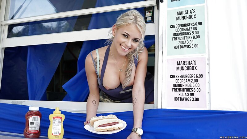 Cute blonde girl wants to treat us with a fresh hot dog and appetizing tits