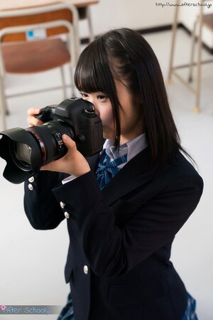 Curious Asian girl blows her teacher while holding her camera
