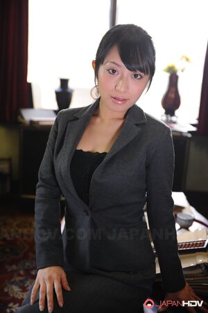Exquisite Japanese business lady models in sexy uniform in the office