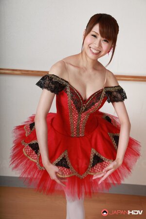 Joyful Japanese ballerina prefers to dance with her perky tits exposed