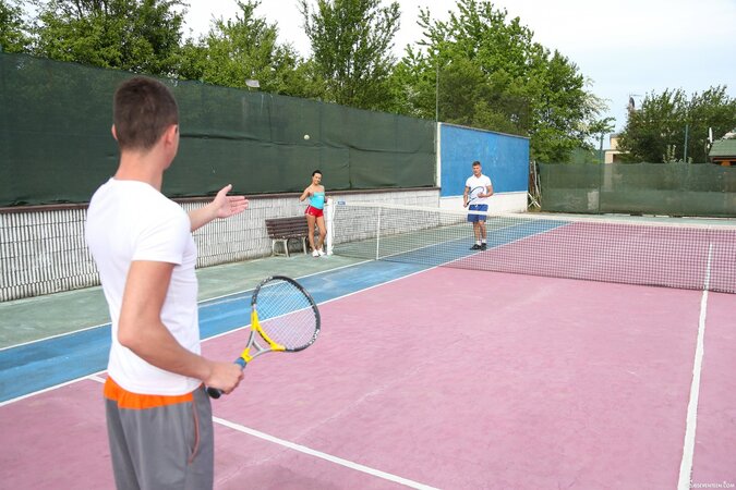 Brunette babe with small tits interrupting the tennis match