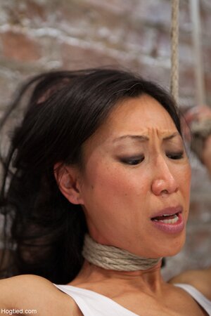 Tia Ling gets tied up and punished with a vibrator