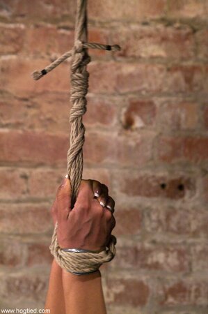 Isis Love gets punished with a vibrator while naked in rope bondage