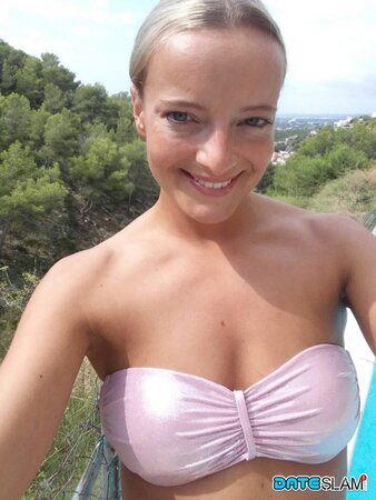 Blonde with a huge forehead showing her amazing tits