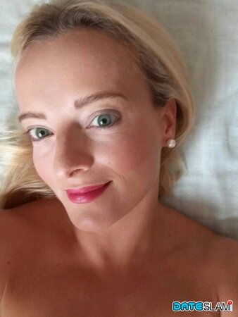 Blonde with a huge forehead showing her amazing tits